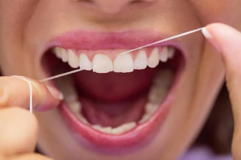 The-Ultimate-Guide-How-to-Floss-Teeth-by-Expert-Dental-Care-in-Bali